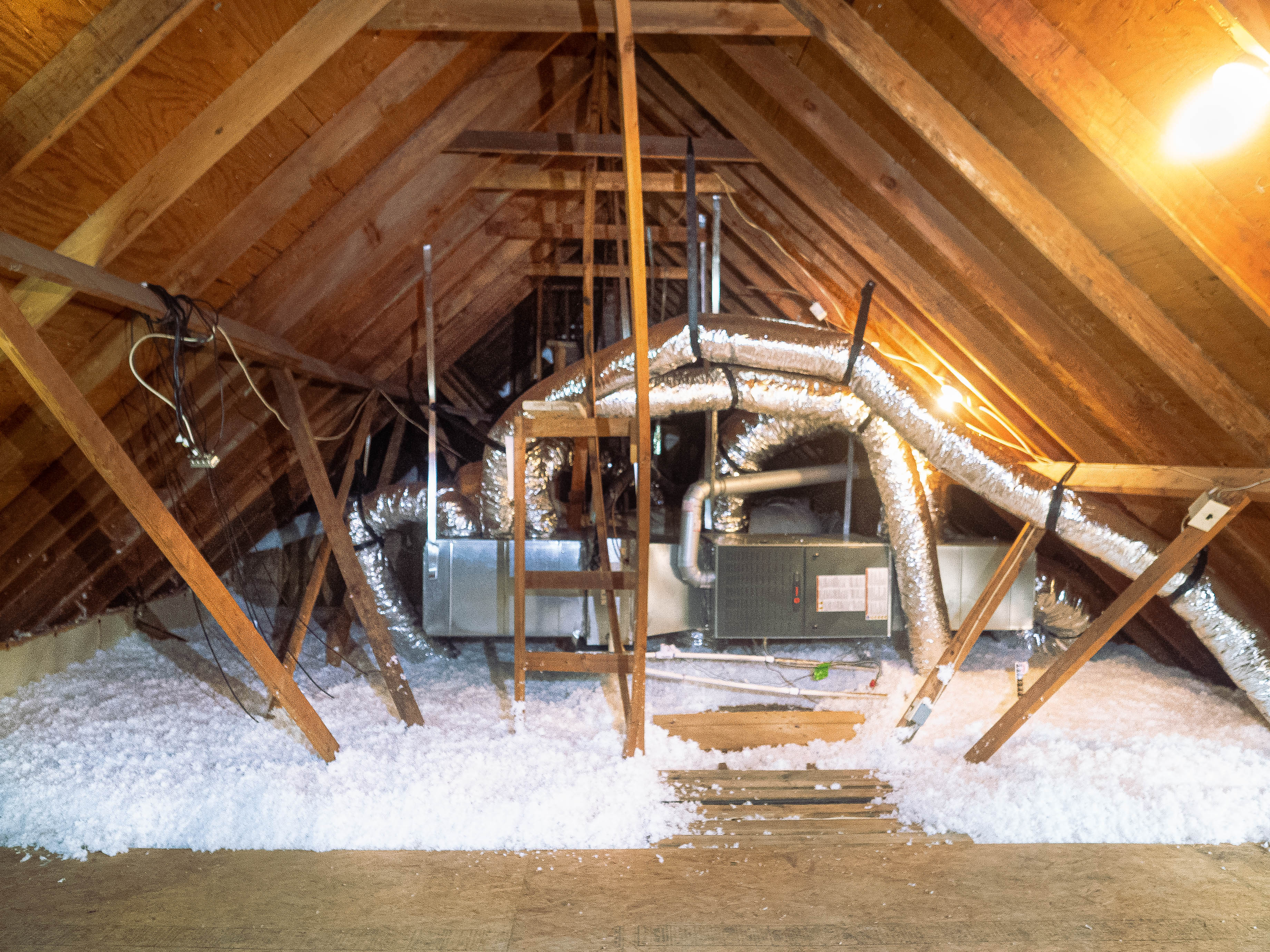 An attic with blown-in insulation